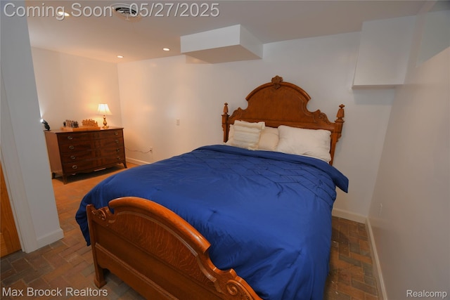 58282 Savage Rd, Vandalia, MI 49095 - bedroom featuring brick flooring, baseboards, and recessed lighting