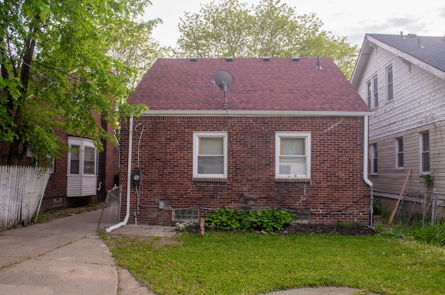 5790 Lakepointe St, Detroit, MI 48224 - view of side of property featuring brick siding and a shingled roof