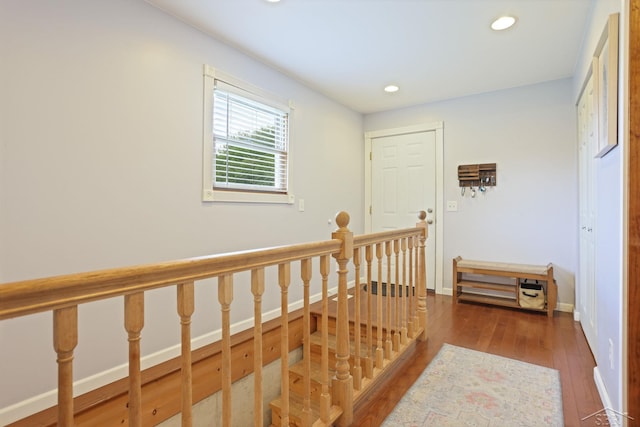 6115 N Belsay Rd, Flint, MI 48506 - hall with an upstairs landing, wood finished floors, recessed lighting, and baseboards