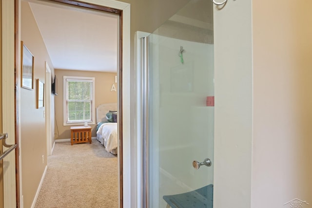 6115 N Belsay Rd, Flint, MI 48506 - ensuite bathroom featuring a stall shower and baseboards