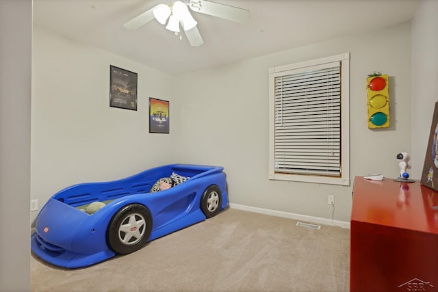 6115 N Belsay Rd, Flint, MI 48506 - bedroom featuring carpet flooring, baseboards, and a ceiling fan