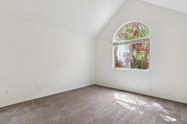 5496 Michael Dr, Ypsilanti, MI 48197 - carpeted empty room with baseboards and high vaulted ceiling