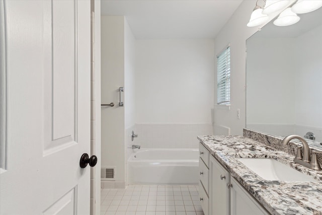 5496 Michael Dr, Ypsilanti, MI 48197 - full bath with tile patterned flooring, vanity, and a bath