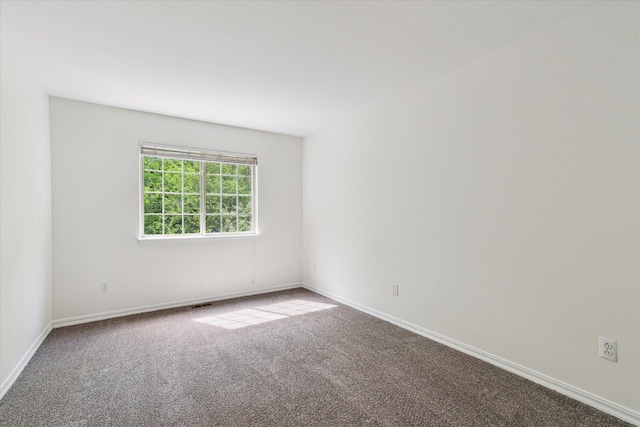 5496 Michael Dr, Ypsilanti, MI 48197 - spare room featuring carpet flooring and baseboards