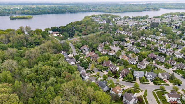 5496 Michael Dr, Ypsilanti, MI 48197 - aerial perspective of suburban area with a nearby body of water and a heavily wooded area