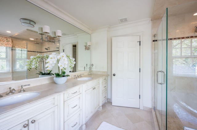 316 Chesterfield Ave, Birmingham, MI 48009 - full bath featuring crown molding, a shower stall, double vanity, and tile patterned floors
