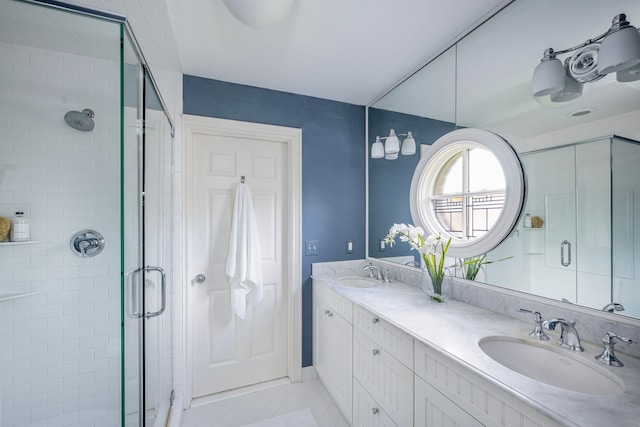 316 Chesterfield Ave, Birmingham, MI 48009 - full bathroom with a stall shower, tile patterned floors, and double vanity