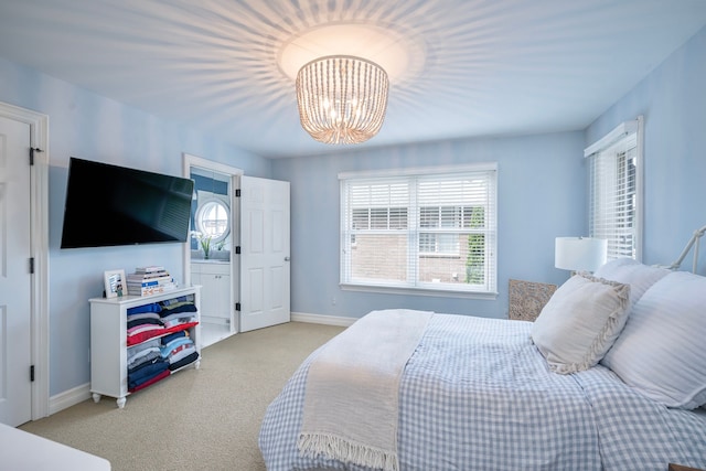 316 Chesterfield Ave, Birmingham, MI 48009 - bedroom featuring carpet, a chandelier, and baseboards