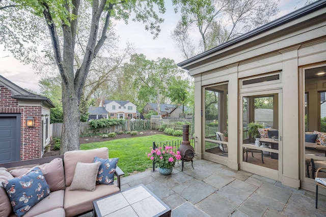 316 Chesterfield Ave, Birmingham, MI 48009 - view of patio with outdoor lounge area, a sunroom, and a residential view