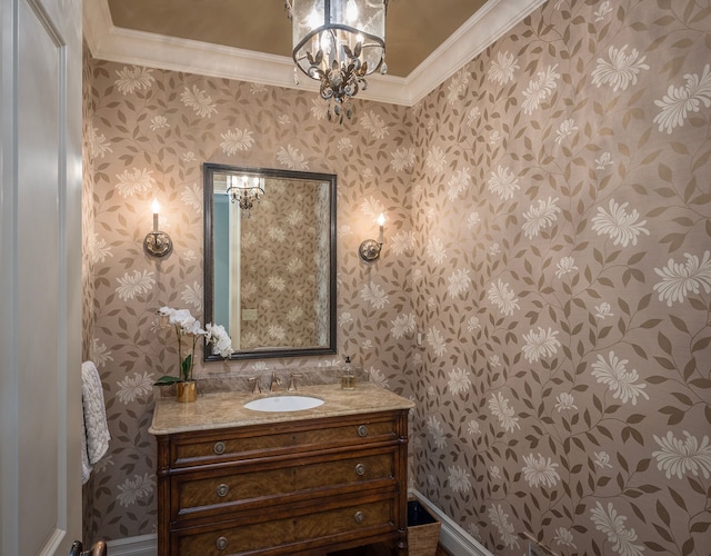316 Chesterfield Ave, Birmingham, MI 48009 - bathroom with wallpapered walls, crown molding, vanity, and a chandelier