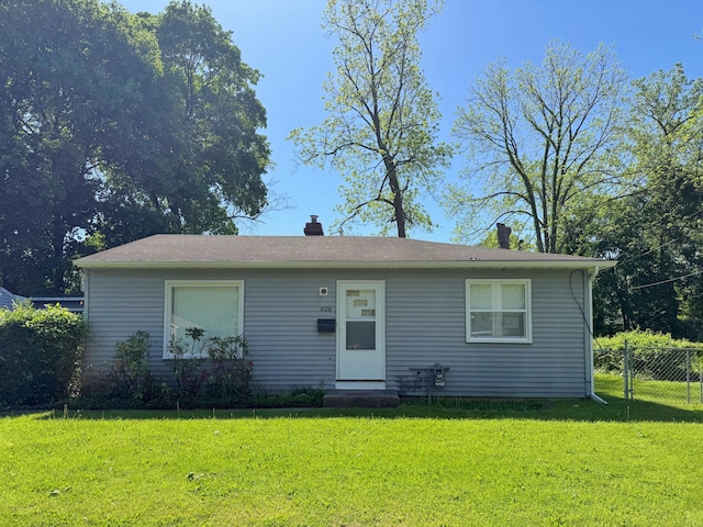 808 Woolsey Dr SW, Grand Rapids, MI 49503 - bungalow-style home with a chimney