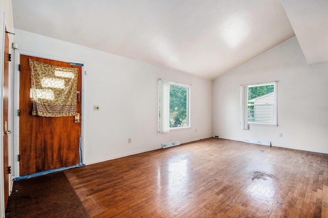 808 Woolsey Dr SW, Grand Rapids, MI 49503 - unfurnished room with hardwood / wood-style flooring and lofted ceiling