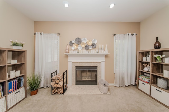 57677 Blossom Valley Trl, New Hudson, MI 48165 - carpeted living room with a fireplace with flush hearth
