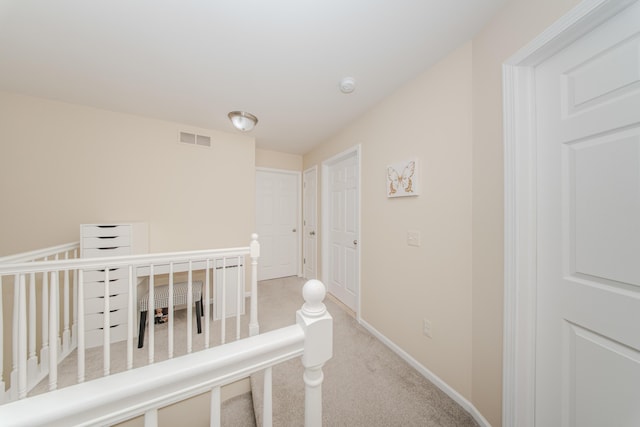 57677 Blossom Valley Trl, New Hudson, MI 48165 - hall with carpet flooring and baseboards