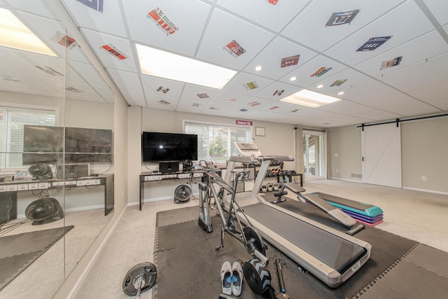 57677 Blossom Valley Trl, New Hudson, MI 48165 - gym featuring carpet floors, a drop ceiling, and baseboards