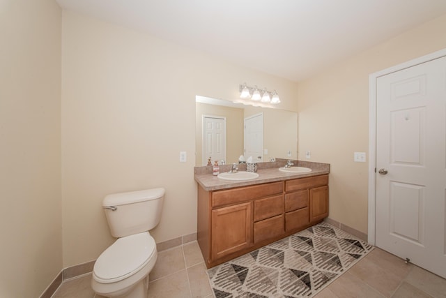 57677 Blossom Valley Trl, New Hudson, MI 48165 - full bath with tile patterned floors, double vanity, toilet, and baseboards