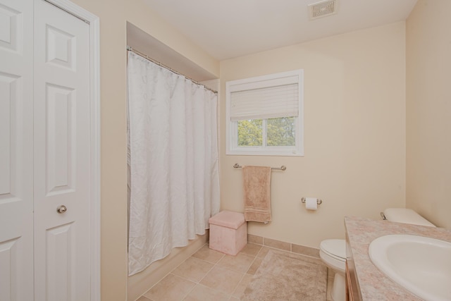 57677 Blossom Valley Trl, New Hudson, MI 48165 - bathroom featuring toilet, vanity, baseboards, tile patterned flooring, and a shower with curtain