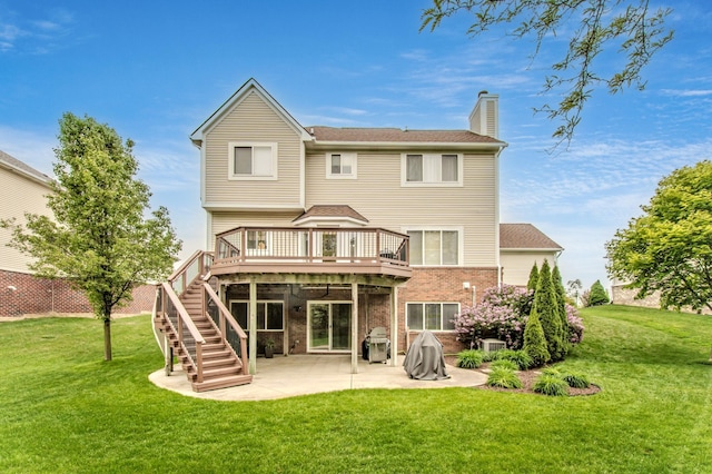 57677 Blossom Valley Trl, New Hudson, MI 48165 - rear view of property featuring a chimney, a wooden deck, a lawn, and a patio