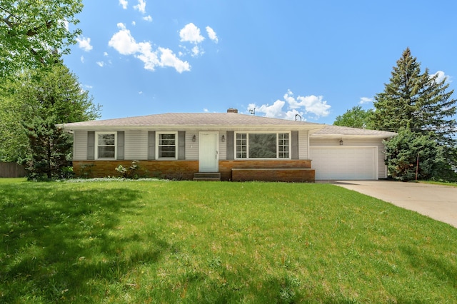 8118 Bruning St, Portage, MI 49002 - ranch-style house with brick siding, a garage, driveway, a front yard, and a chimney