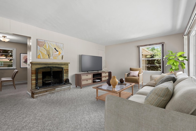8118 Bruning St, Portage, MI 49002 - living area featuring a stone fireplace and carpet
