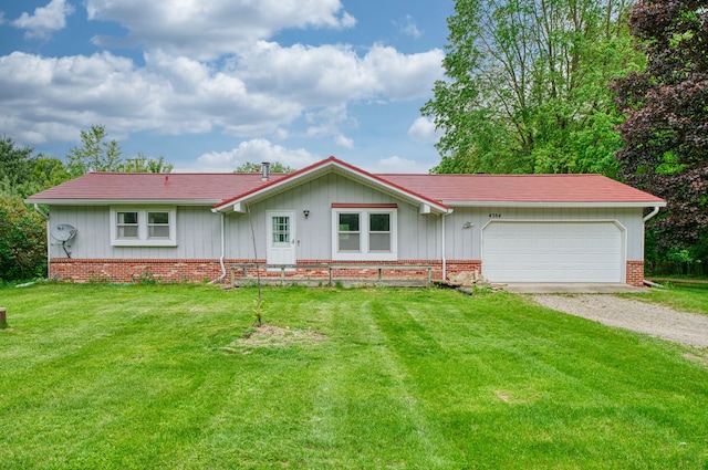 4384 Dexter Pinckney Rd, Dexter, MI 48130 - single story home featuring driveway, a garage, a front lawn, and brick siding
