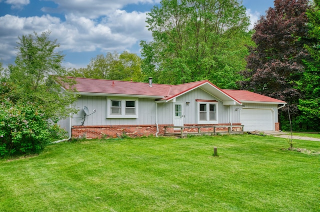 4384 Dexter Pinckney Rd, Dexter, MI 48130 - ranch-style house with an attached garage, driveway, a front lawn, and board and batten siding