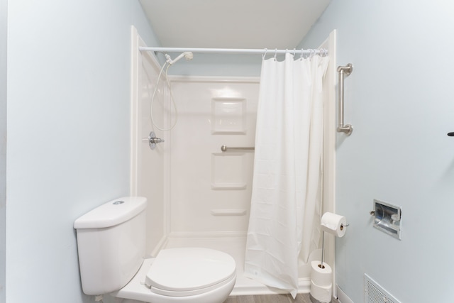 4384 Dexter Pinckney Rd, Dexter, MI 48130 - bathroom featuring a shower stall and toilet