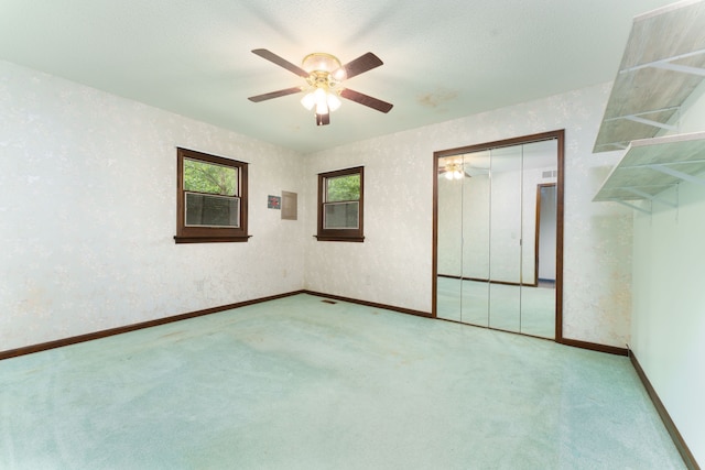 4384 Dexter Pinckney Rd, Dexter, MI 48130 - carpeted spare room featuring ceiling fan and baseboards