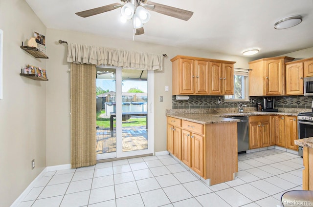2426 Camel Dr, Sterling Heights, MI 48310 - kitchen with stainless steel appliances, decorative backsplash, ceiling fan, and light stone countertops