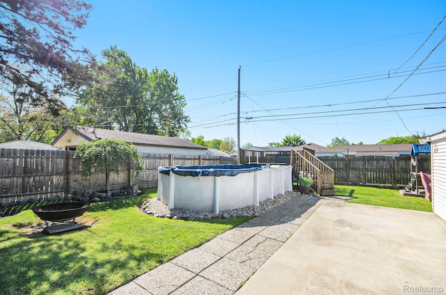 2426 Camel Dr, Sterling Heights, MI 48310 - view of yard featuring a patio