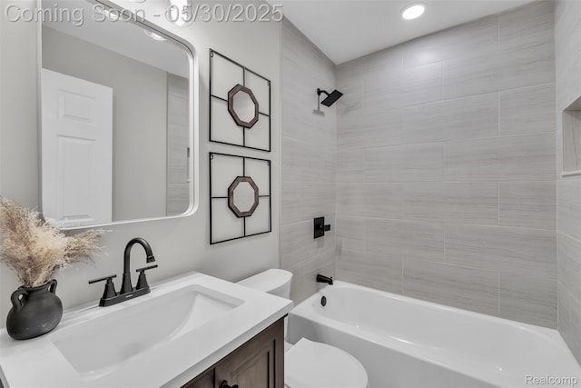 22929 Wrexford Dr, Southfield, MI 48033 - bathroom featuring toilet, vanity, tub / shower combination, and recessed lighting