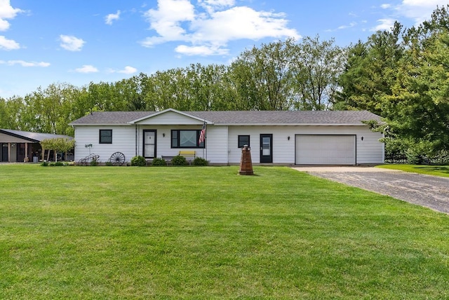 19354 Bueche Rd, New Lothrop, MI 48460 - ranch-style home with driveway, an attached garage, and a front lawn