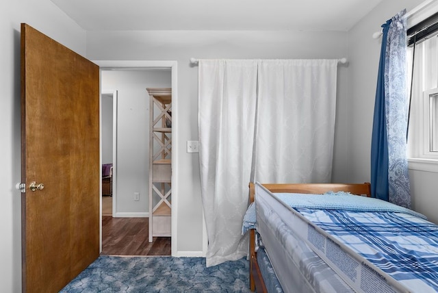 19354 Bueche Rd, New Lothrop, MI 48460 - bedroom with baseboards and wood finished floors