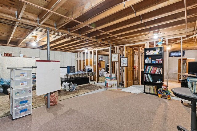 19354 Bueche Rd, New Lothrop, MI 48460 - unfinished basement featuring carpet flooring