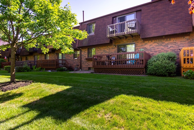 38554 Lanse Creuse St, Harrison Township, MI 48045 - rear view of property with mansard roof, a balcony, brick siding, and roof with shingles