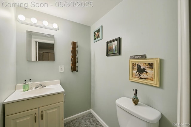 326 Redmaple Ln, Brighton, MI 48116 - bathroom with vanity, toilet, and baseboards