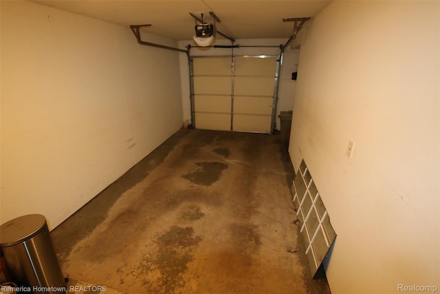 44703 Erin Dr, Plymouth, MI 48170 - garage featuring a garage door opener