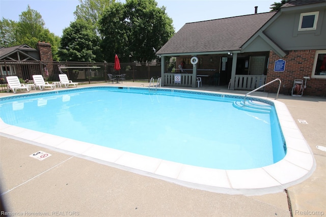 44703 Erin Dr, Plymouth, MI 48170 - community pool featuring a patio