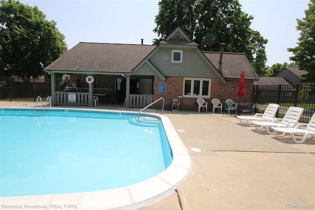 44703 Erin Dr, Plymouth, MI 48170 - community pool with a patio area