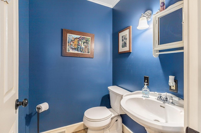 10191 84th St SE, Alto, MI 49302 - half bathroom with a sink, baseboards, and toilet