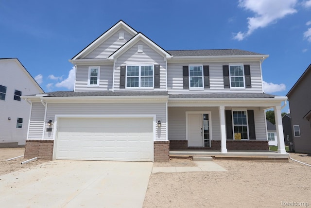 27144 Silo Dr, Saline, MI 48176 - view of front facade with brick siding, concrete driveway, covered porch, and a garage