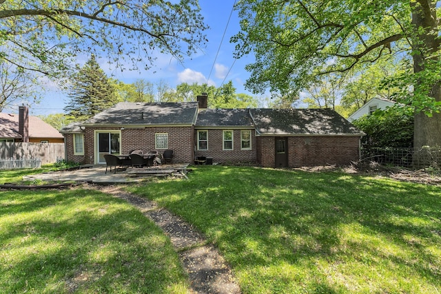 3418 Fieldview Ave, West Bloomfield, MI 48324 - rear view of property featuring brick siding, a patio area, and a chimney