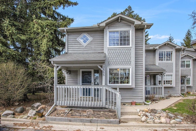 2666 Packard Rd, Ann Arbor, MI 48104 - view of front of property with covered porch and roof with shingles