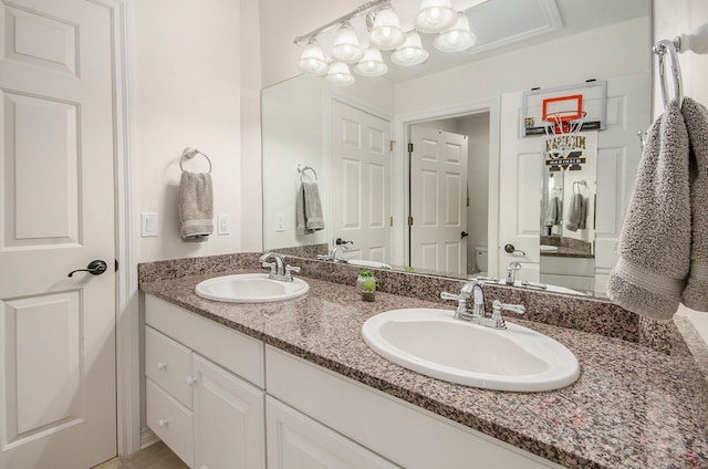 4181 Pavilion Ct, Fenton, MI 48430 - full bathroom featuring double vanity and toilet