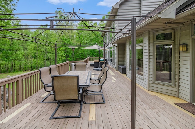 4181 Pavilion Ct, Fenton, MI 48430 - deck featuring outdoor dining space and an outdoor hangout area