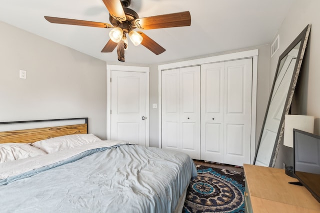 bedroom with a closet and a ceiling fan