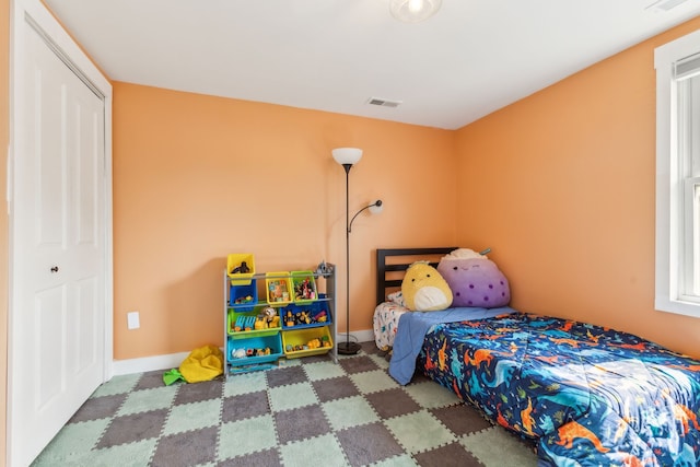 bedroom with baseboards