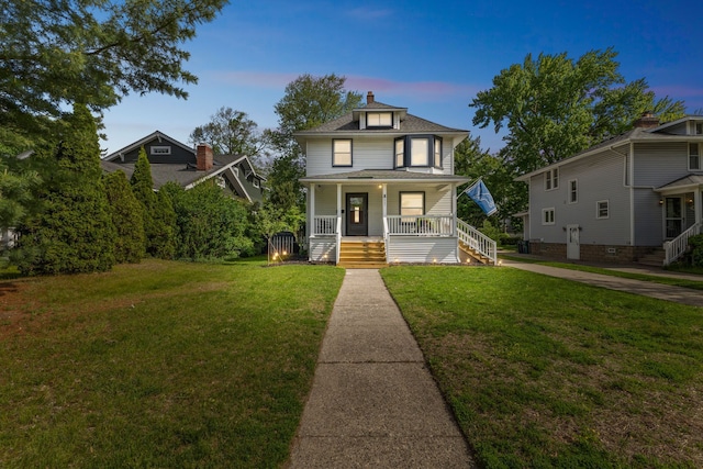 traditional style home with a porch, stairway, a yard, and a chimney