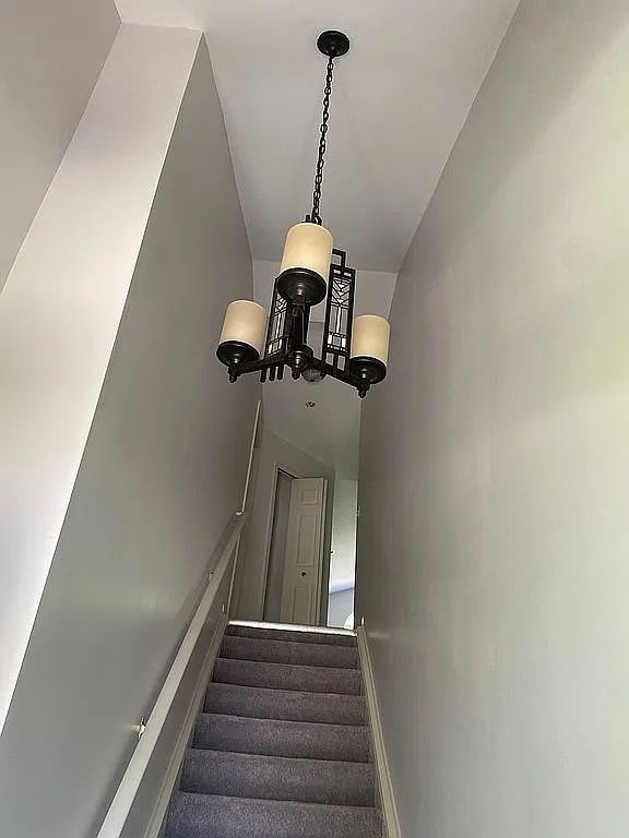 18203 Adri Cir, Walled Lake, MI 48390 - stairway featuring baseboards