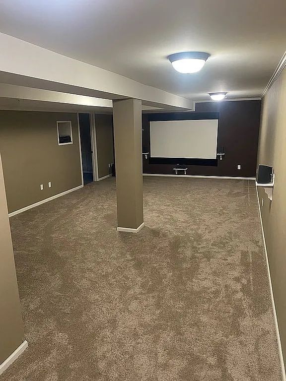 18203 Adri Cir, Walled Lake, MI 48390 - cinema with baseboards and carpet